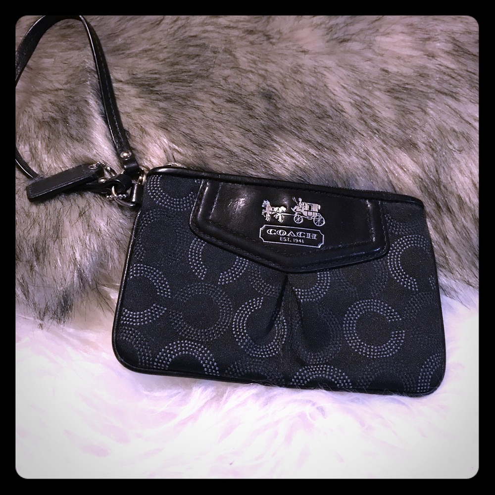 Coach black signature mini wristlet.